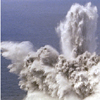 Thumbnail showing exploding spray of water during test of depth charges from USS Arkansas.