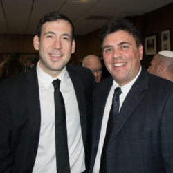Two men in business attire, posing for photo. Todd Sandler, director of the Brooklyn Jewish National Fund, on left, and Richard Klass on the right. Photo by Rob Abruzzese.