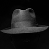 Fedora hat, 1950s noir film style. Image used to illustrate an article by Richard Klass involving the Doctrine of Res Judicata.